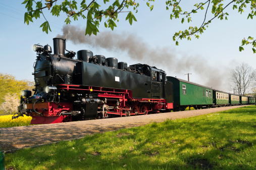 Historical German steam train in spring