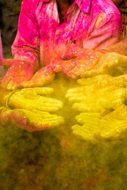 istock Colorful Hands celebrating Holi festival 490312691