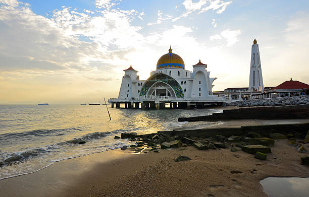 istock majestic floating mosque at malacca straits during sunset 490312732
