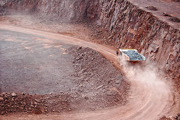 istock dumper truck on road in surface mine quarry 490312827