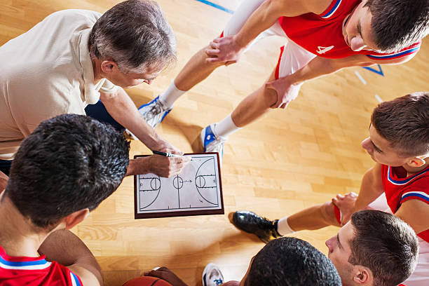 istock Basketball coach with his team. 490313539