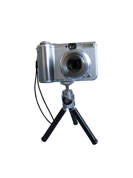 istock Gray digital photo camera on tripod isolated over white 490316743