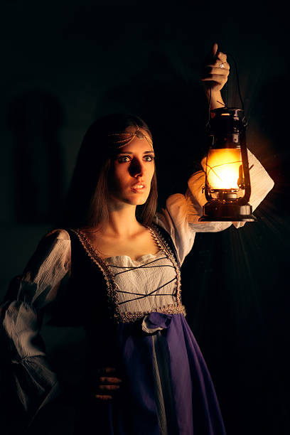 istock Beautiful Medieval Princess Holding Lantern 490336866