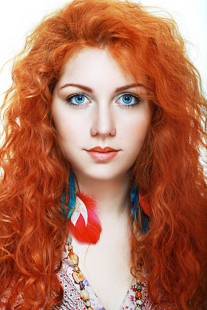 istock woman with red hair 490338080