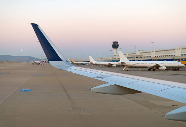 istock Wing of an airplane, view from window. 490340912