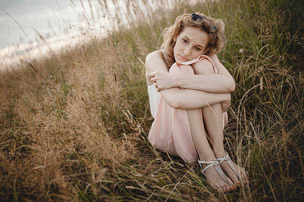 istock Happy woman jumping on meadow. 490341568