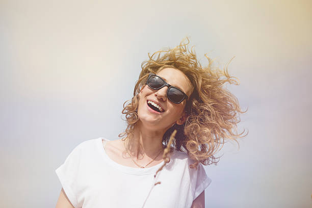 istock Happy woman jumping on meadow. 490341608