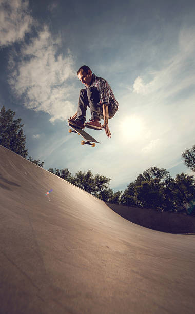 istock Street skateboarder practicing Ollie at the skate park. 490341946