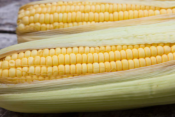 istock Fresh sweet corn on wooden table 490342096