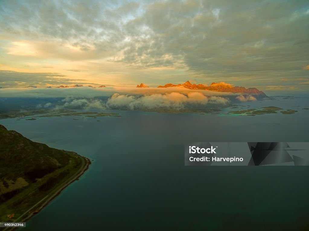 Midnight sun on Lofoten Magnificent peaks on Lofoten islands in Norway lit by midnight sun 2015 Stock Photo