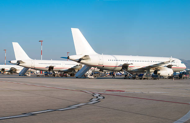 istock Passenger planes in the airport. Aircraft maintenance. 490344324