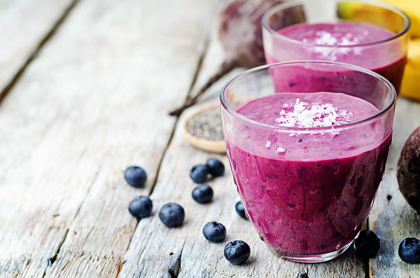 istock beet banana coconut blueberry Chia seed smoothies 490344588
