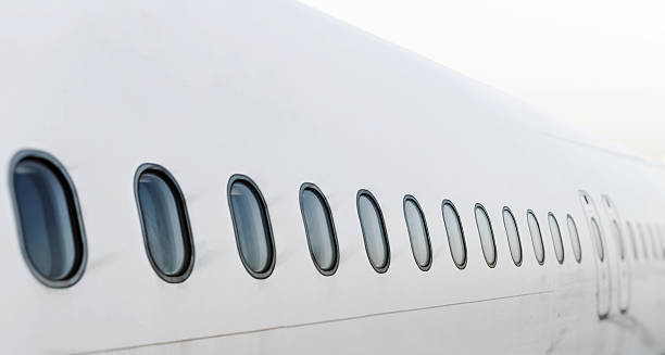 istock Passenger aircraft windows. View from outside. 490344618