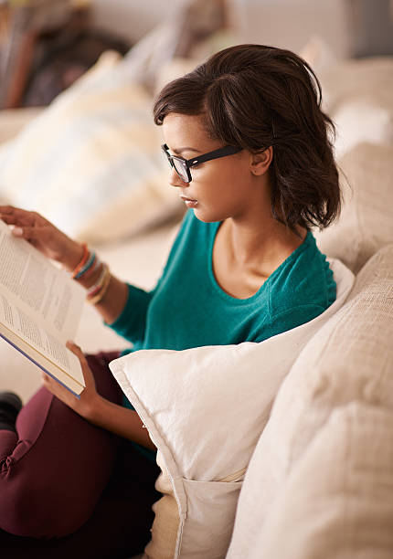 istock Taking a break with the latest bestseller 490348924