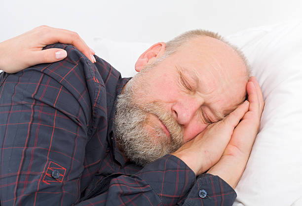 Home care A picture of an elderly man sleeping sleeping grandpa stock pictures, royalty-free photos & images