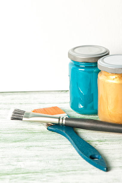 istock Paint brush, acrylic paint and canvas on the tabel 490358002