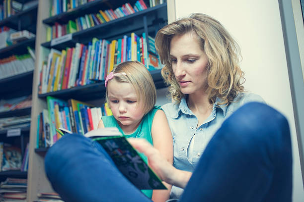 istock Education and fun. Kids with teacher playing games in classroom 490359852