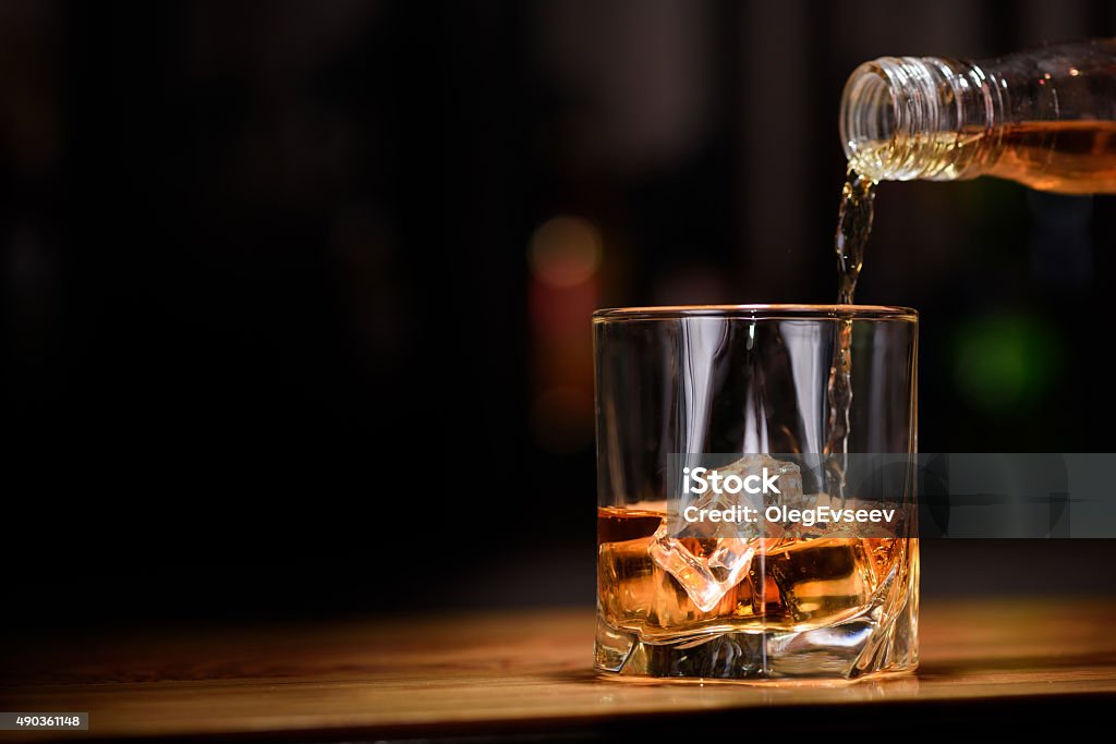 Still life. pour or whiskey in to glass Still life. pour or whiskey in to glass. Alcohol - Drink Stock Photo