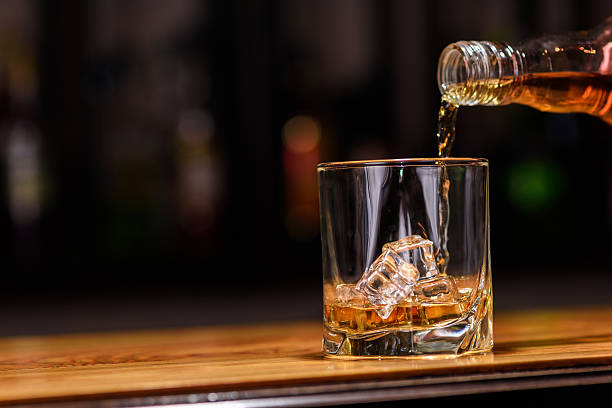 istock Still life. pour or whiskey in to glass 490361170