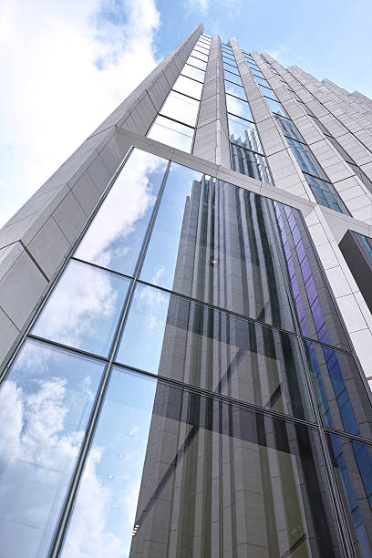 istock Modern office Skyscrapers on the sunny beautiful cloudy sky 490366196
