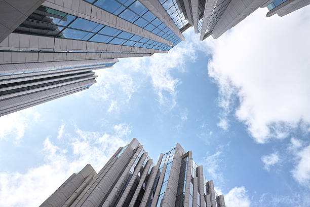 istock Modern office Skyscrapers on the sunny beautiful cloudy sky 490366334