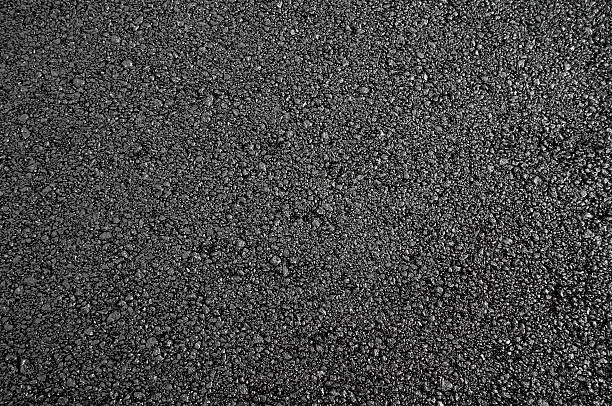 New asphalt Photo of dark asphalted surface background asphalt stock pictures, royalty-free photos & images