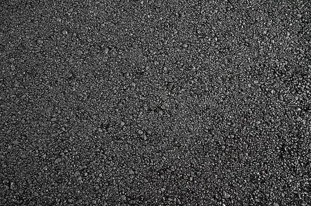 Photo of dark asphalted surface background