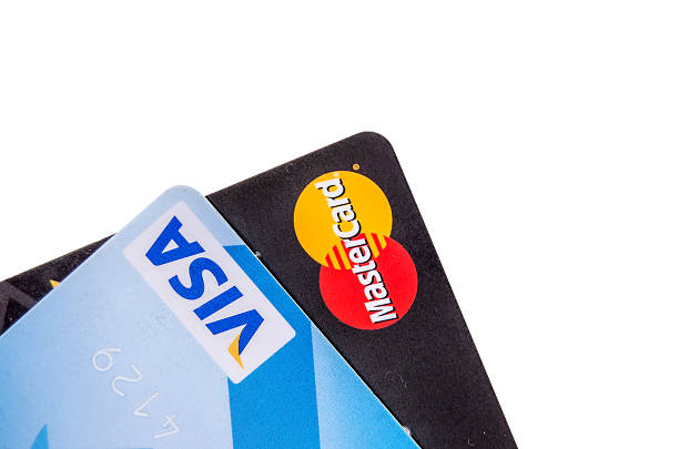 Ternopil, Ukraine - September 27, 2015: MasterCard and Visa credit cards isolated on white background
