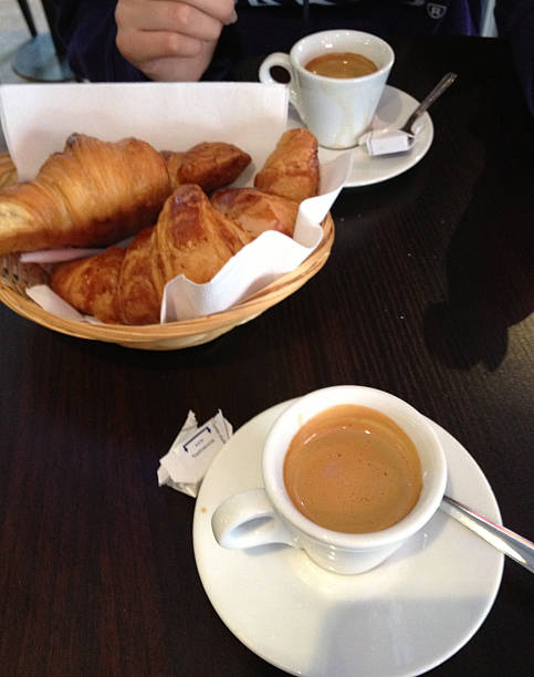 istock Italian espresso with croissant 490371496