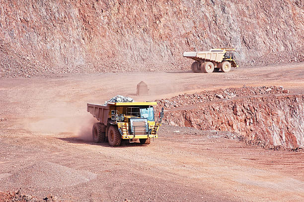 istock dumper truck in surface mine quarry 490375149