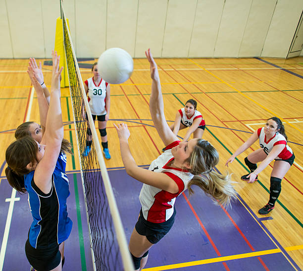 волейбол в студенческом стиле - sport volleyball high school student teenager стоковые фото и изображения