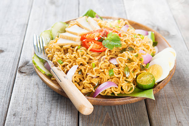 istock Asian spicy fried curry instant noodles 490375285