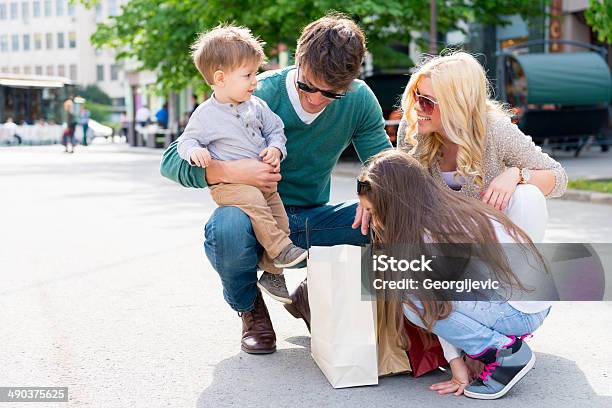 Family In Shopping Stock Photo - Download Image Now - Adult, Beautiful People, Beauty