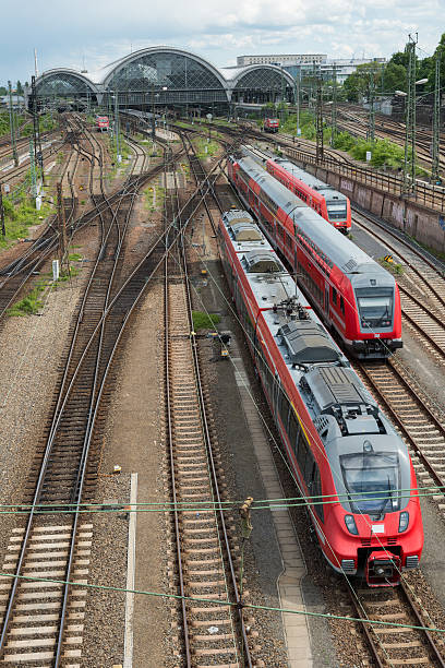 railway station with red trains in germany