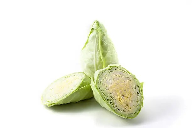 Pointed cabbage on a white background