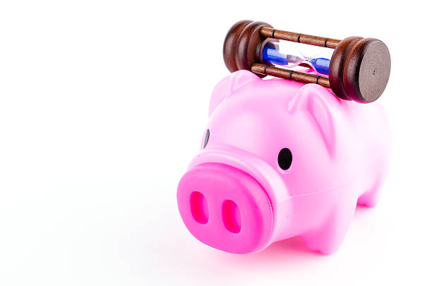 istock piggy bank sand clock isolated white background 490377557