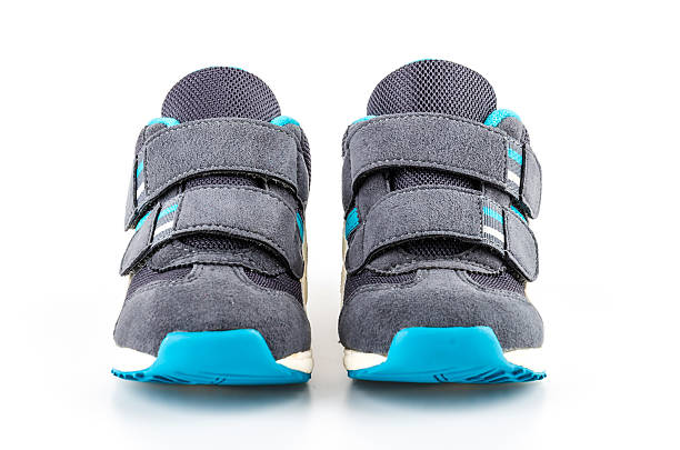 istock Sport shoes isolated white 490378093