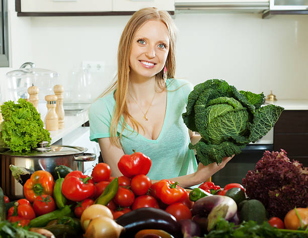 istock housewife with  cabbage and other vegetables 490378193
