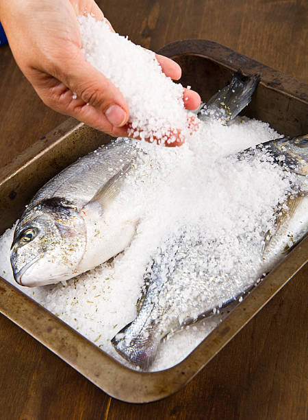 istock Gilt head sea bream baked in  salt 490380555