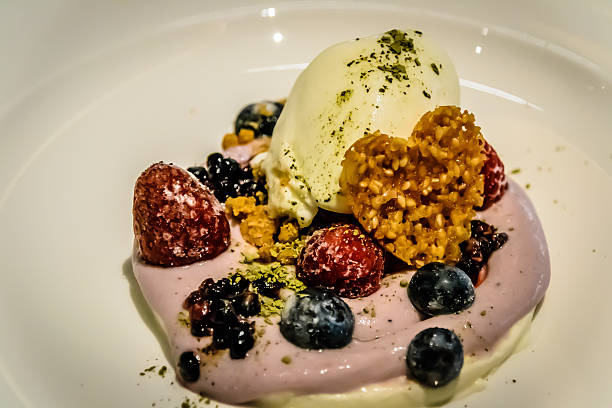 istock Ice cream dessert with yoghurt blackberry, raspberry and blue berry 490388736