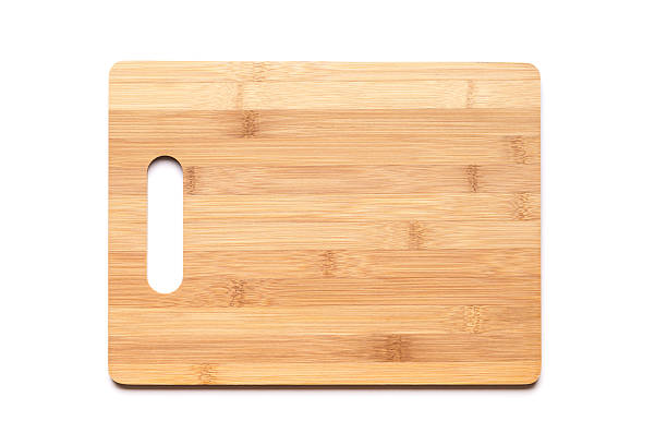 istock New cutting board made of bamboo on white 490390536