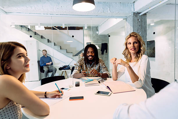istock Happy businesswoman in office 490392084