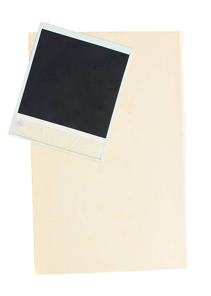 istock aged page and old instant photo 490395386