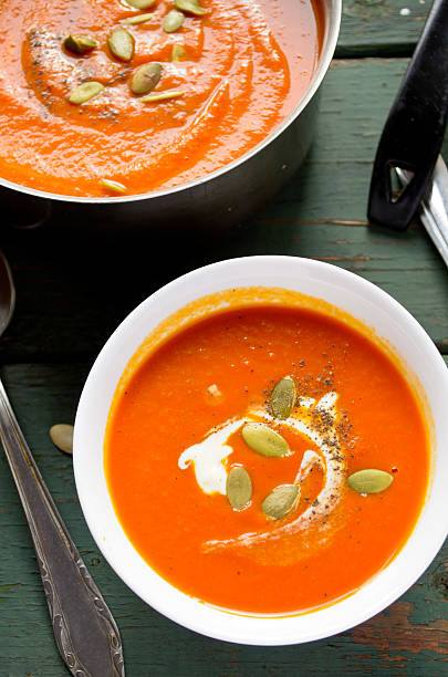 istock Vegetarian pumpkin-lentils cream soup with pepo seed 490397016
