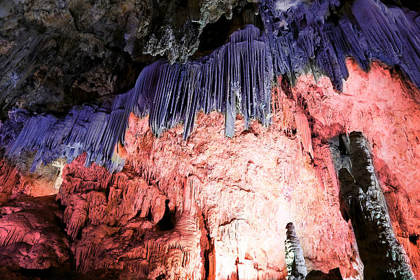 Interior of Natural Cave in Andalusia, Spain Interior of Natural Cave in Andalusia, Spain -- Inside the Cuevas de Nerja are a variety of geologic cave formations which create interesting patterns nerja caves stock pictures, royalty-free photos & images