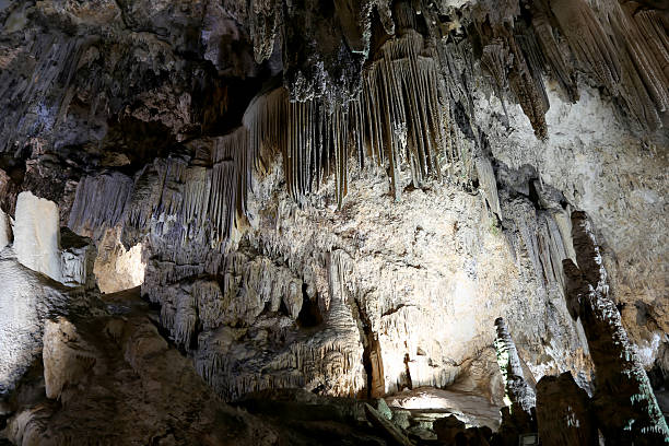 Interior of Natural Cave in Andalusia, Spain Interior of Natural Cave in Andalusia, Spain -- Inside the Cuevas de Nerja are a variety of geologic cave formations which create interesting patterns nerja caves stock pictures, royalty-free photos & images