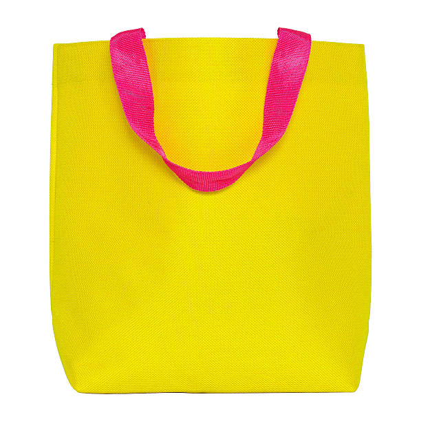istock yellow shopping fabric bag isolated on white 490398484