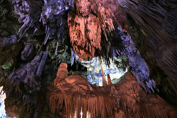 Interior of Natural Cave in Andalusia, Spain Interior of Natural Cave in Andalusia, Spain -- Inside the Cuevas de Nerja are a variety of geologic cave formations which create interesting patterns nerja caves stock pictures, royalty-free photos & images