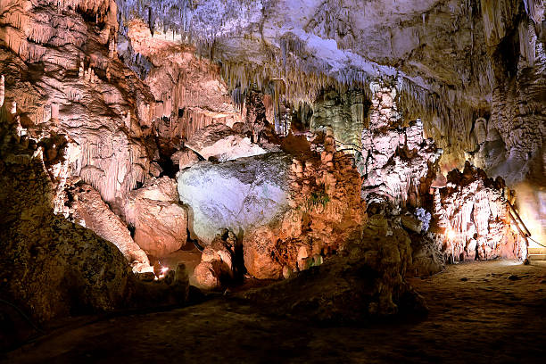 Interior of Natural Cave in Andalusia, Spain Interior of Natural Cave in Andalusia, Spain -- Inside the Cuevas de Nerja are a variety of geologic cave formations which create interesting patterns nerja caves stock pictures, royalty-free photos & images
