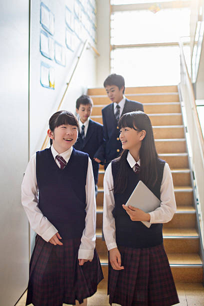 istock Japanese students walking in the school staircase 490398800